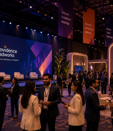 best event and fabrication company in gurgaon hosting a premium corporate event with branded stage setup, networking guests, and immersive venue design in delhi ncr